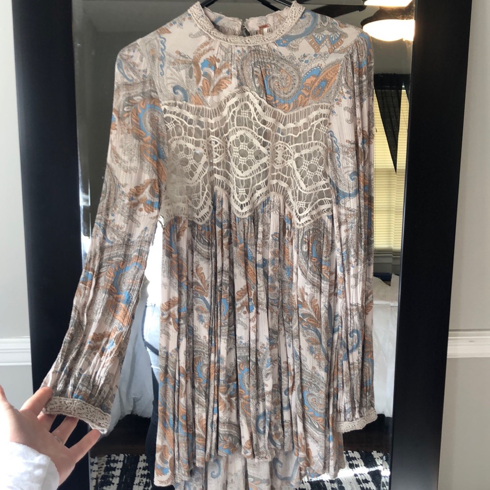 Flowy dress a little high low with lace detail